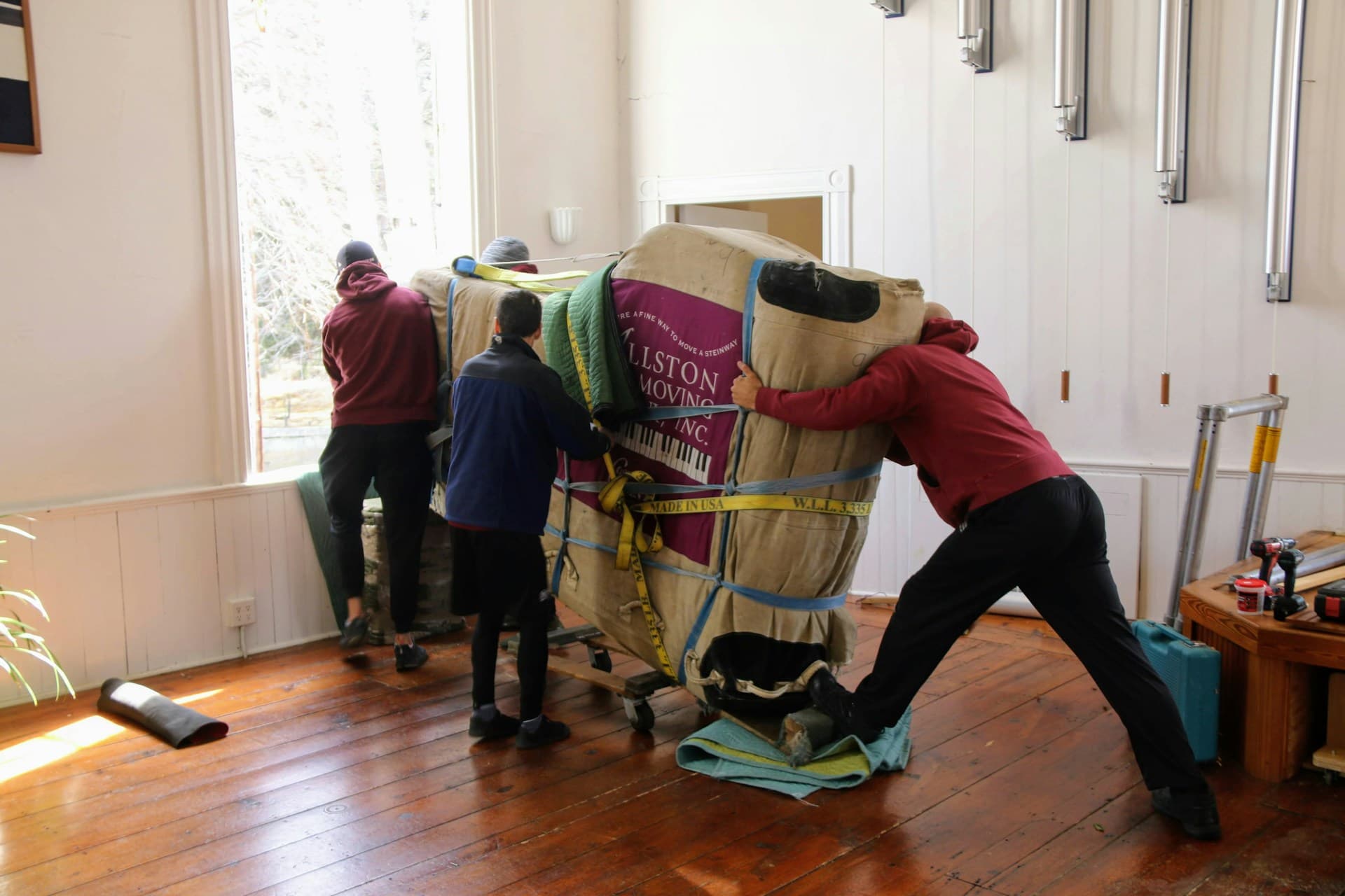 Professional movers moving furniture